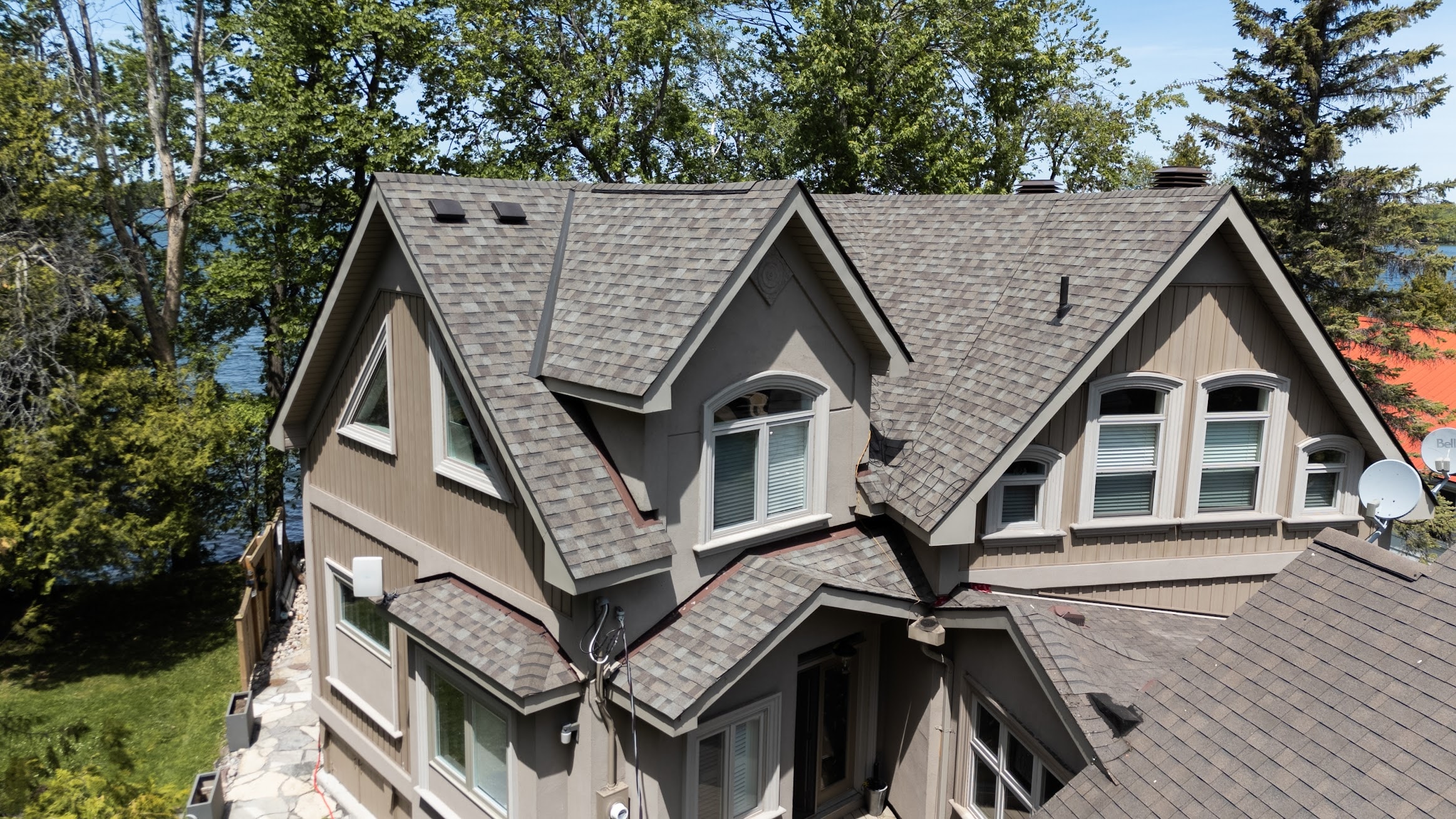 Professional roofing contractor on a roof in Bracebridge, Muskoka